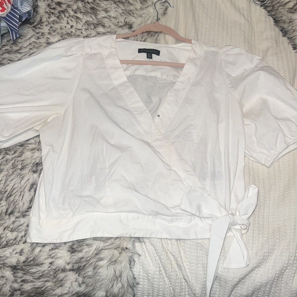 White linen tie cross over top